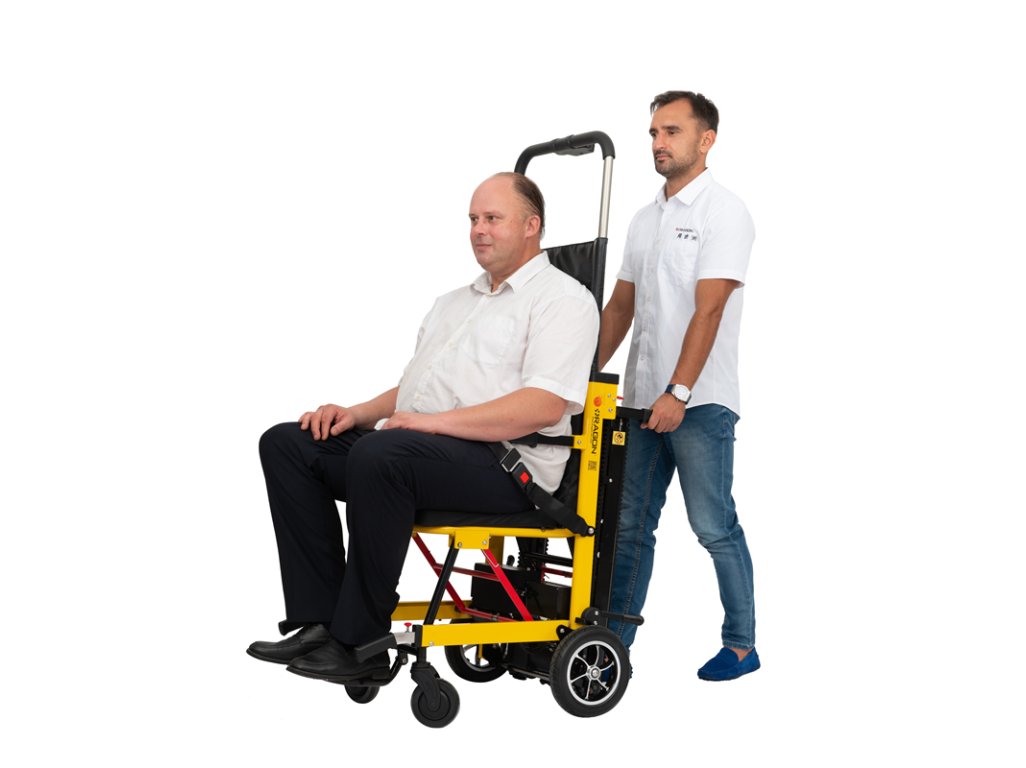 Pásový schodolez s obsluhou